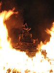 SX16802 Guy on top of bonfire.jpg